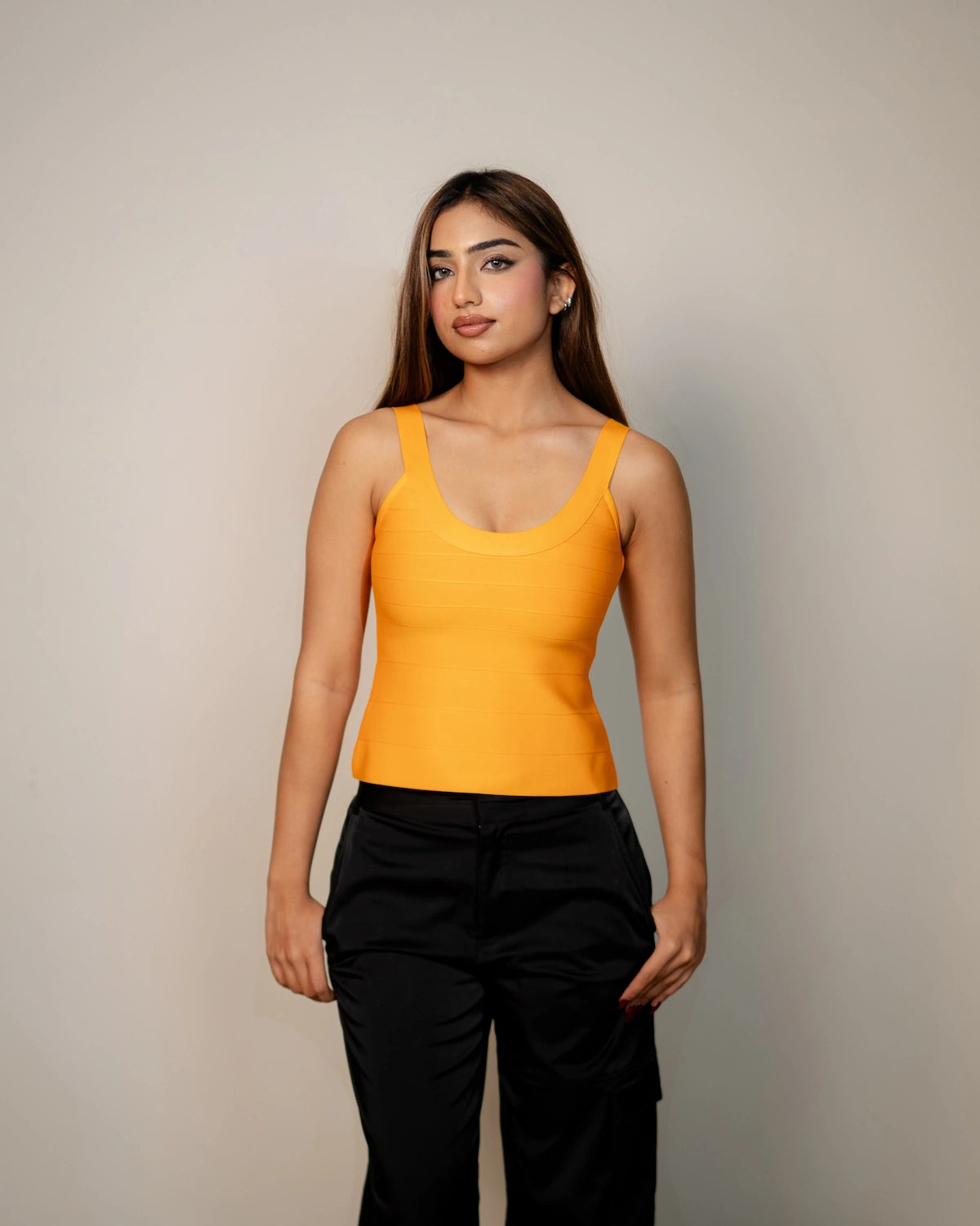Cindy orange sculpting bandage top luxury fitted top by Casual Threat