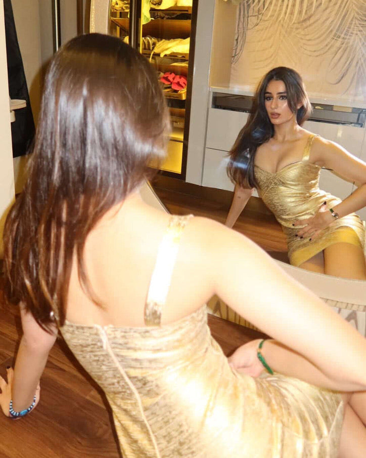 Sifat Mahendru influencer in casual threat naomi gold bandage dress