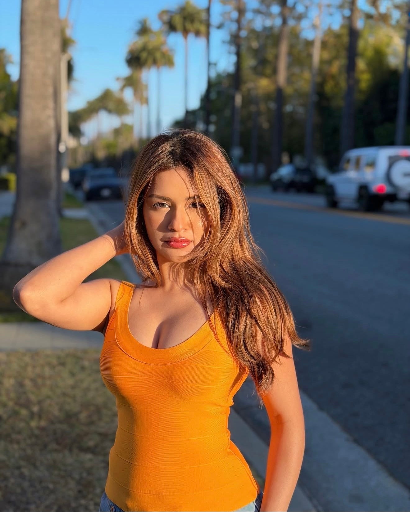 influencer and actress avneet kaur in Cindy orange bandage crop top by Casual Threat close up bandage texture