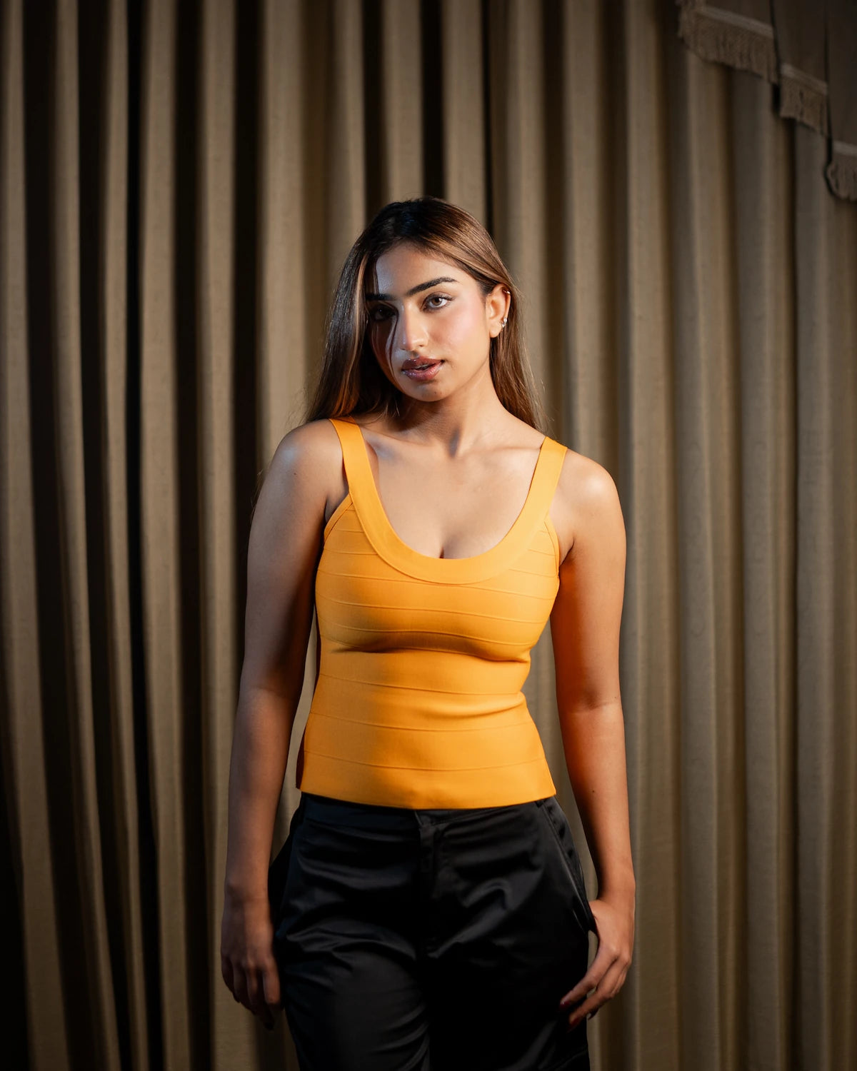 Cindy orange bandage top by Casual Threat front view sculpting fit