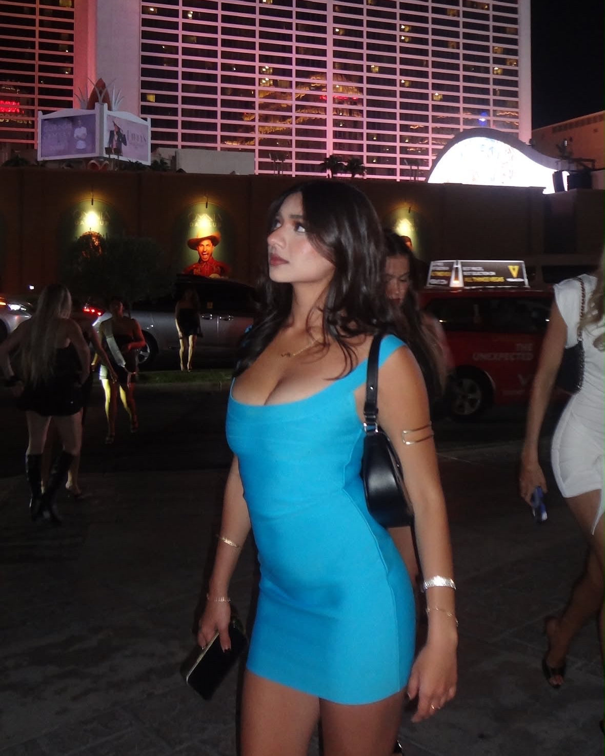 Dhwani Jain wearing the Margot blue bandage bodycon mini dress by Casual Threat, styled for a party night