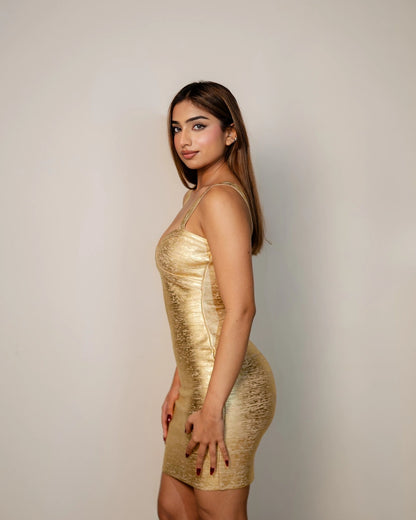 Naomi gold metallic bandage dress close up metallic bandage fabric detail