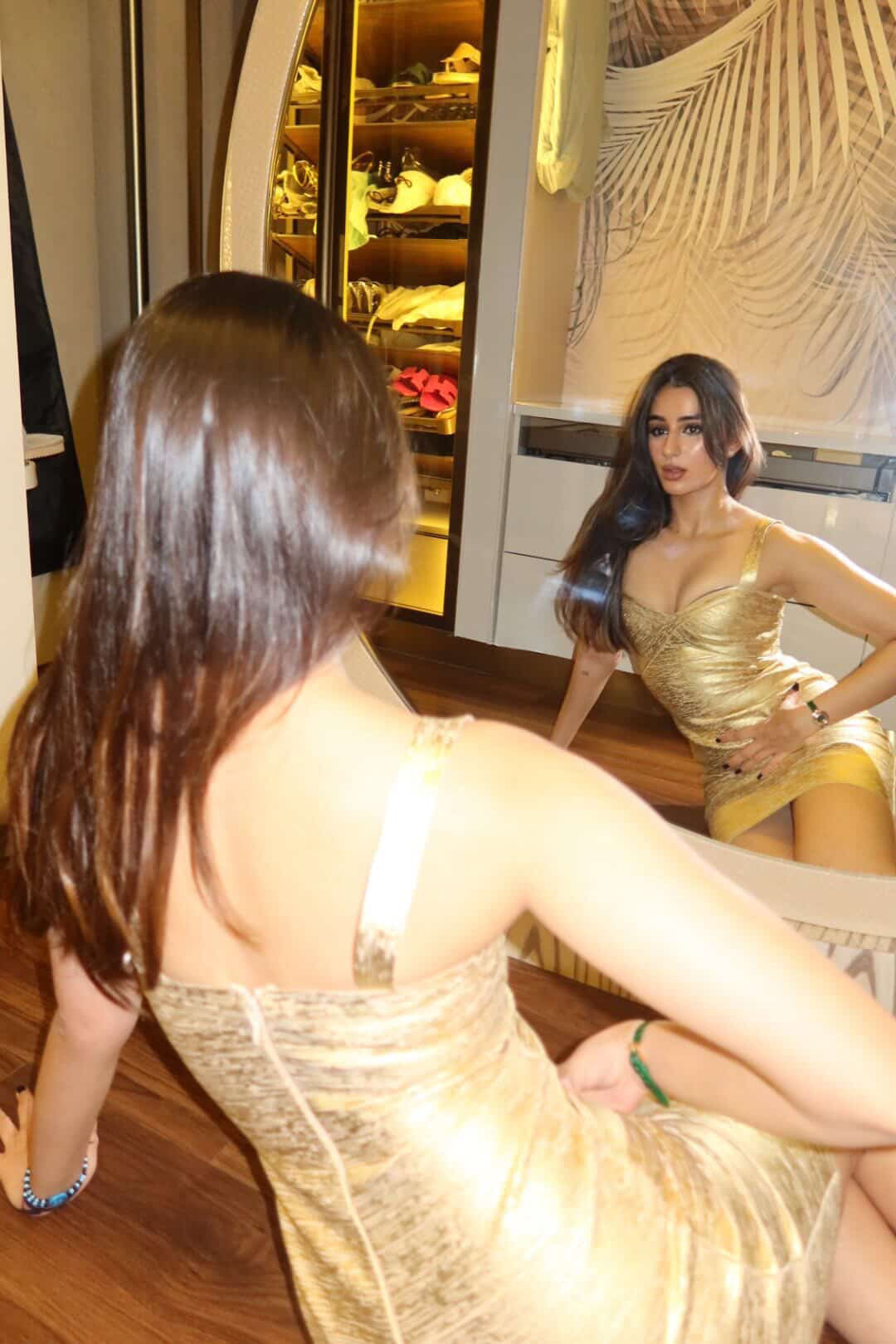 Sifat Mahendru in Casual Threat Naomi gold bandage dress